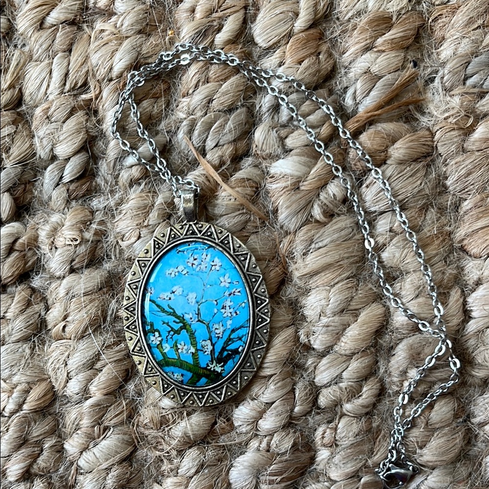 Artistic Silver Pendant Necklace with Blue Tree Design